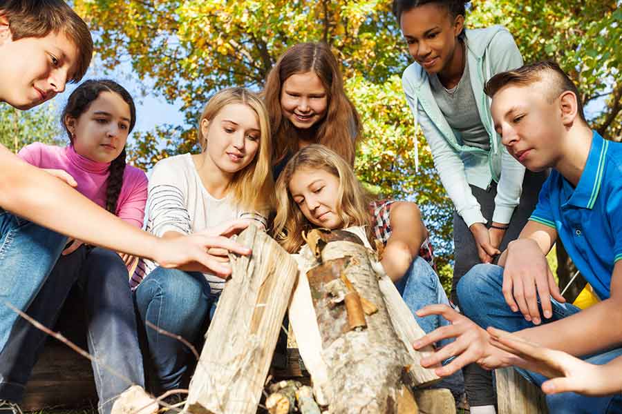 World Heritage Youth Ambassadors Young People Building Campfire